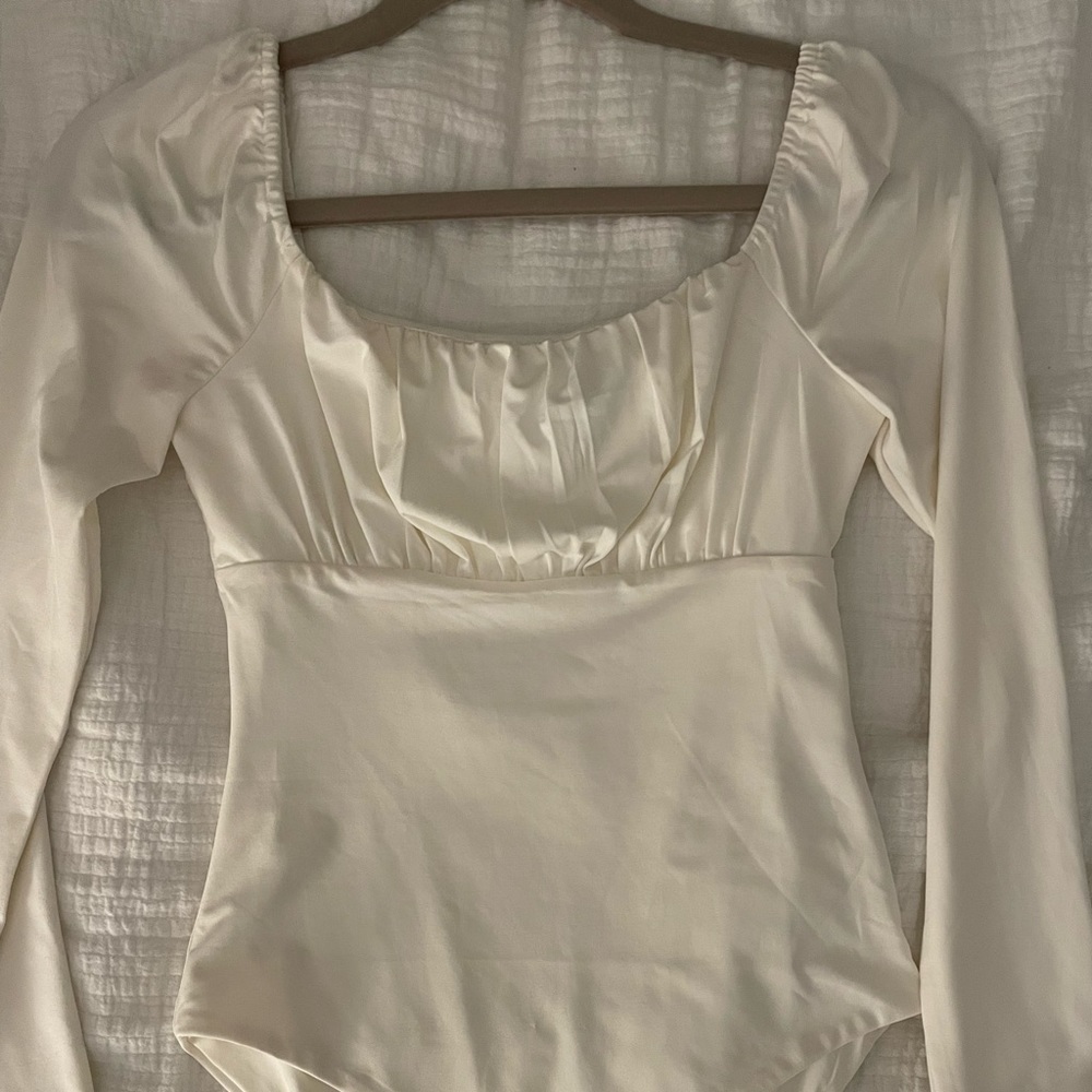 Adorable Princess Polly white bodysuit